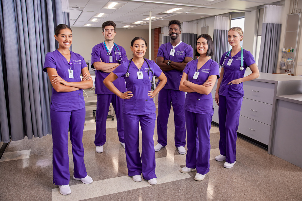 Group of ABSN students pose for a photo