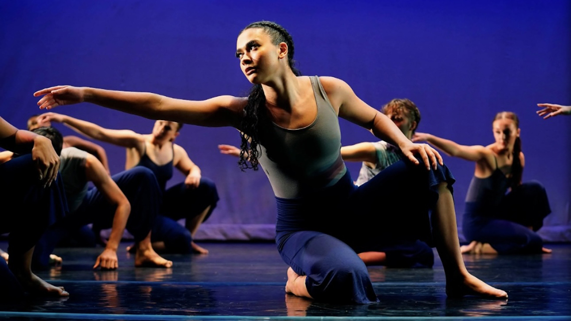 Jordan in a lyrical dance showcase with other students