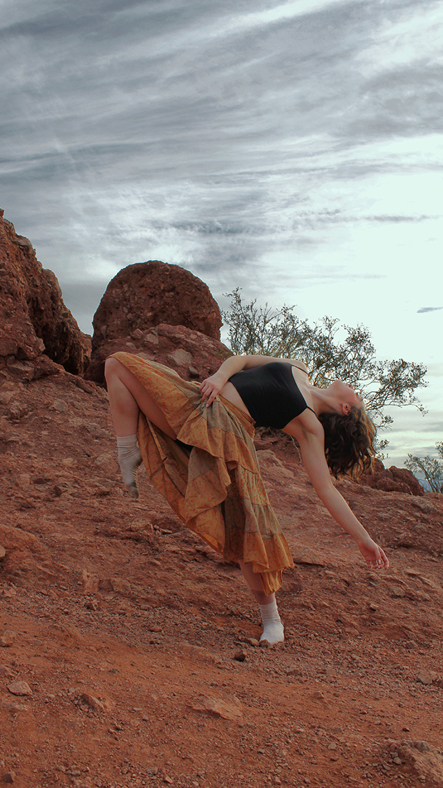 Interpretive dance in desert scenery by Sammi L